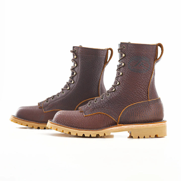 Pair of Bison leather OT work boots on white background