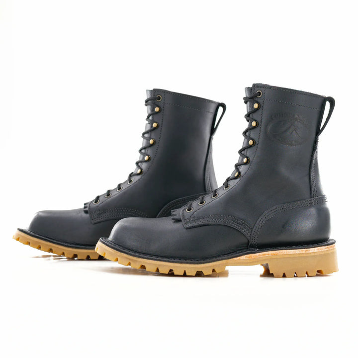 Side view of a pair of OT Black leather work boots on a white background