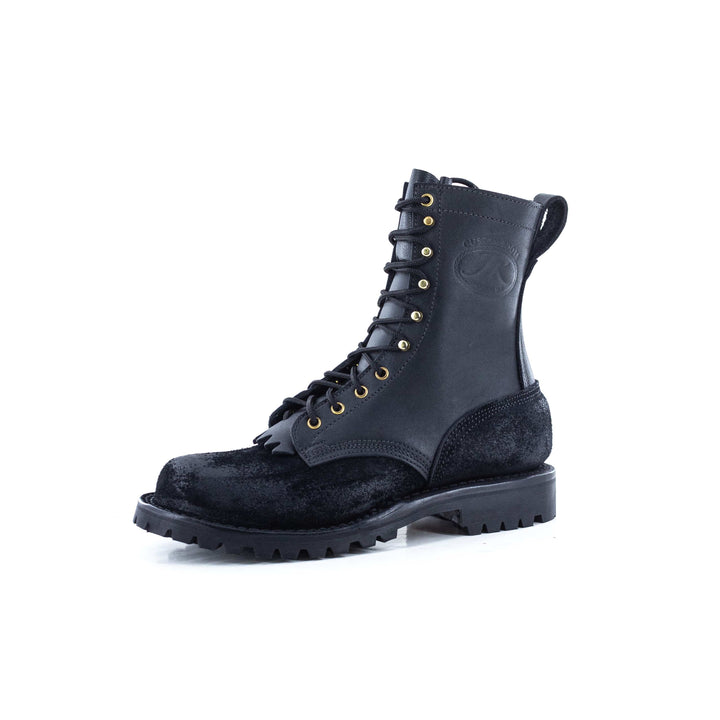 Side view of the OT Pro Black leather work boot on a white background